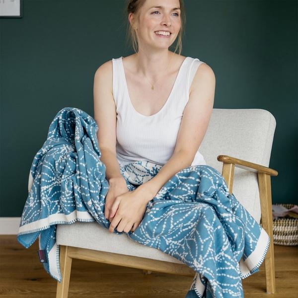 Ibena Ivory / Blue Stylized Flower Organic Cotton Throw Blanket