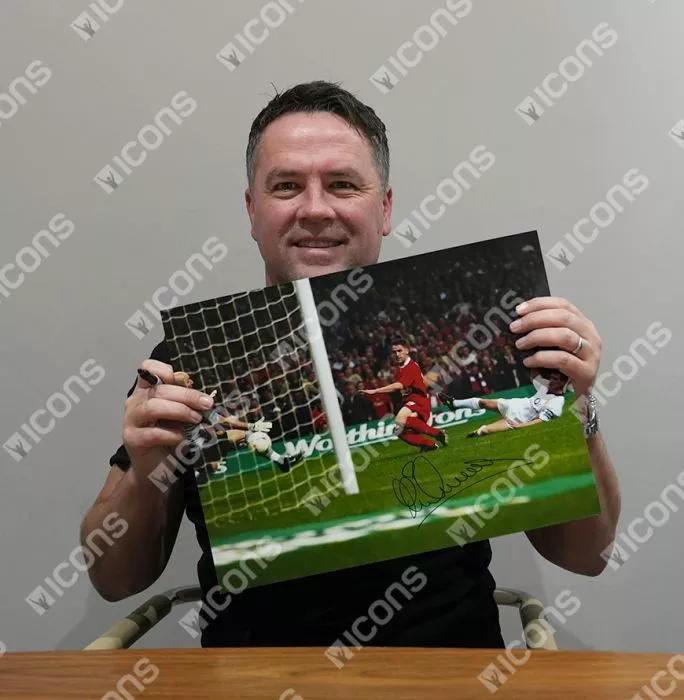 Icons Michael Owen Signed Liverpool FC Photo In Black Wooden Frame: Scoring Against Manchester United