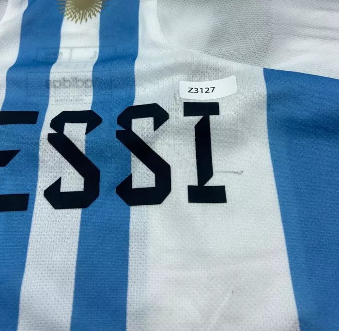 Icons WAREHOUSE SECONDS Lionel Messi Official Back Signed Argentina 2022 Home Shirt (2 Star) - Grade A