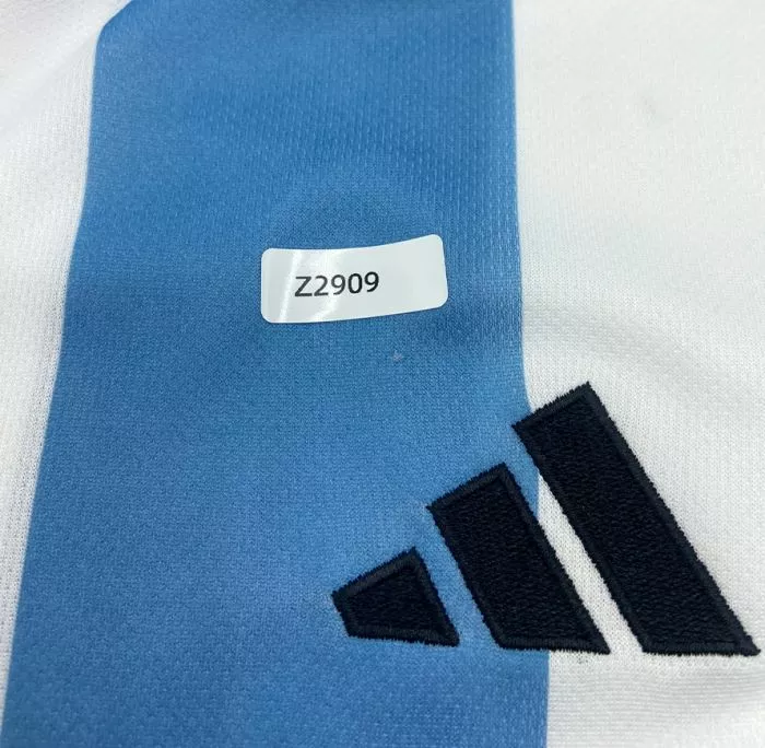 Icons WAREHOUSE SECONDS Lionel Messi Official Front Signed Argentina 2022-23 Home Shirt - GRADE A
