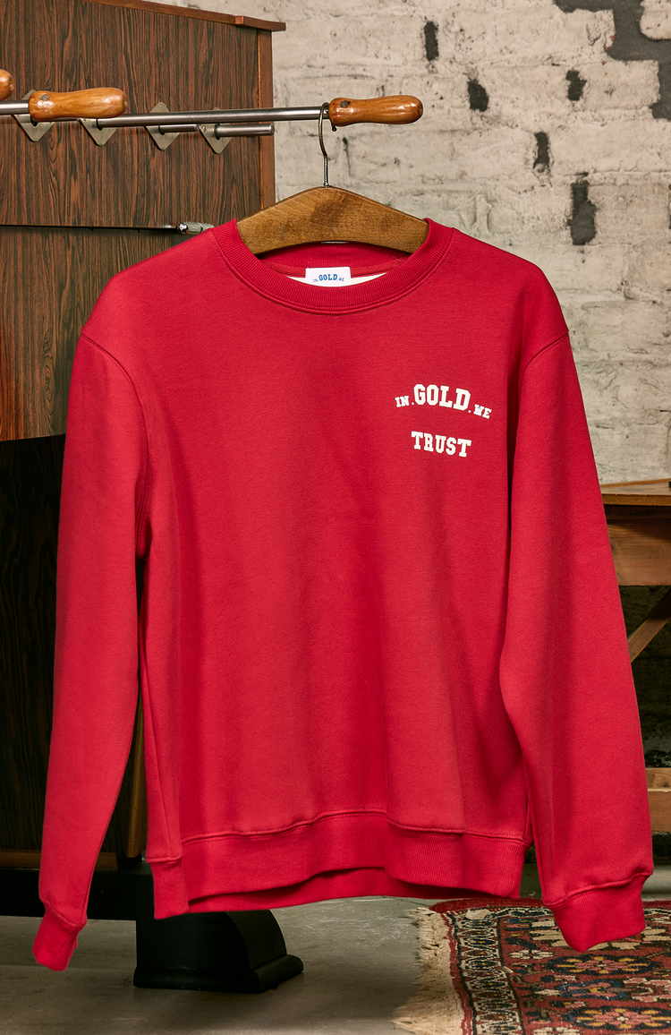 In Gold We Trust The Red Sweater