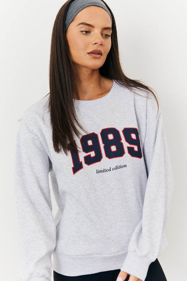 in the style Fits 1989 Printed Graphic Sweatshirt Grey