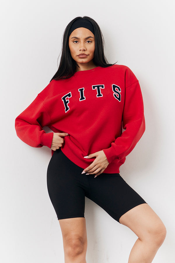 in the style Fits Red Fits Crew Neck Embroidered Sweatshirt Red