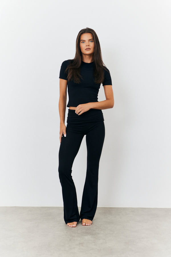 in the style Fits Sculpting Fold Over Waistband Flare Leg Trouser Black