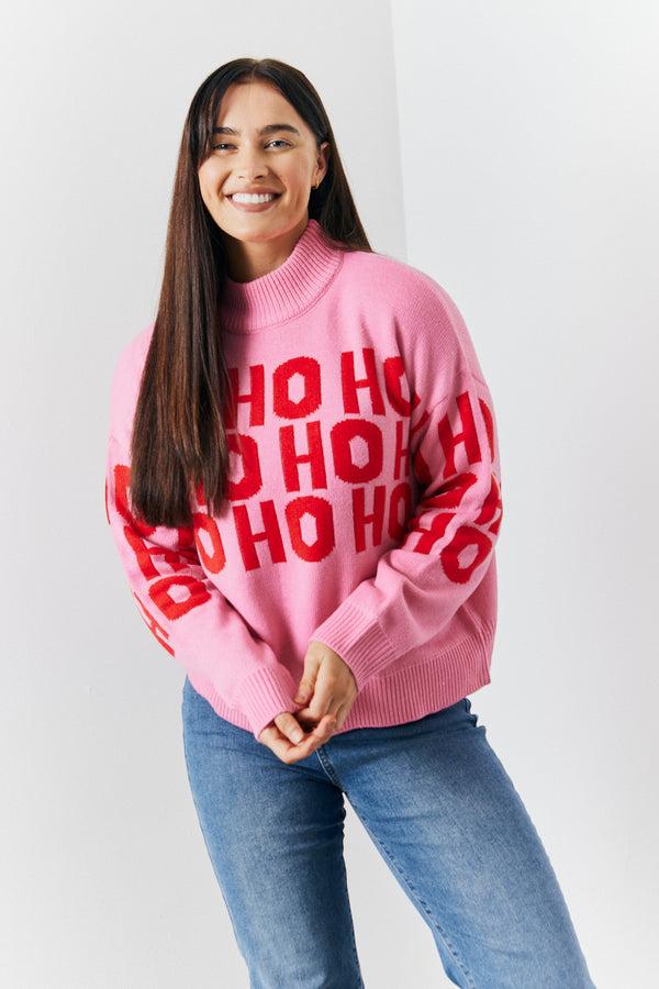 in the style In The Style Crew Neck 'Ho Ho Ho' Slogan Knitted Jumper Pink