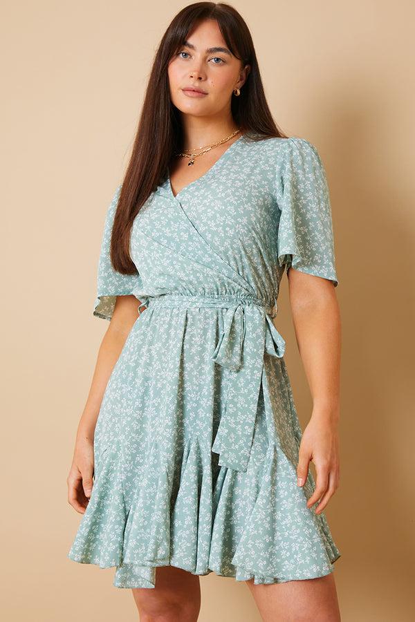 in the style In the Style Floral Wrap Godet Mini Dress Sage