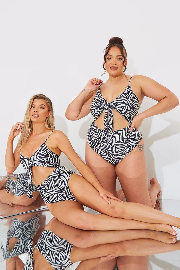 in the style In The Style Sculpt and Control Abstract Print Cut Out Swimsuit Monochrome
