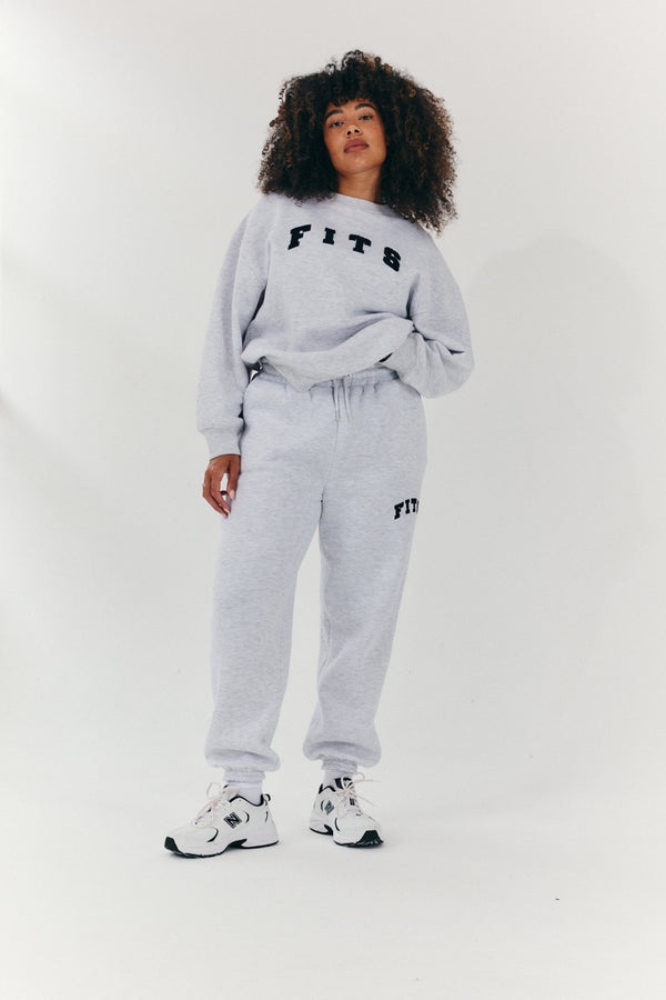in the style {# Title already starts with vendor: print nothing extra #}Fits Embroidered Cuffed Joggers Grey