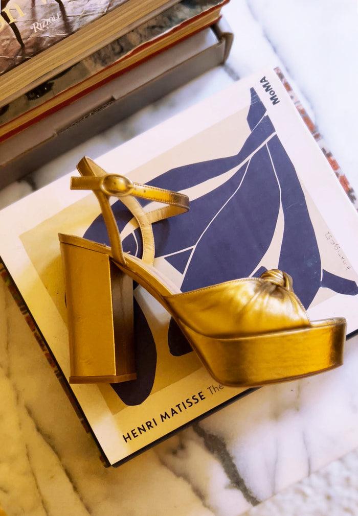 Isa Tapia Macarena Gold Platform