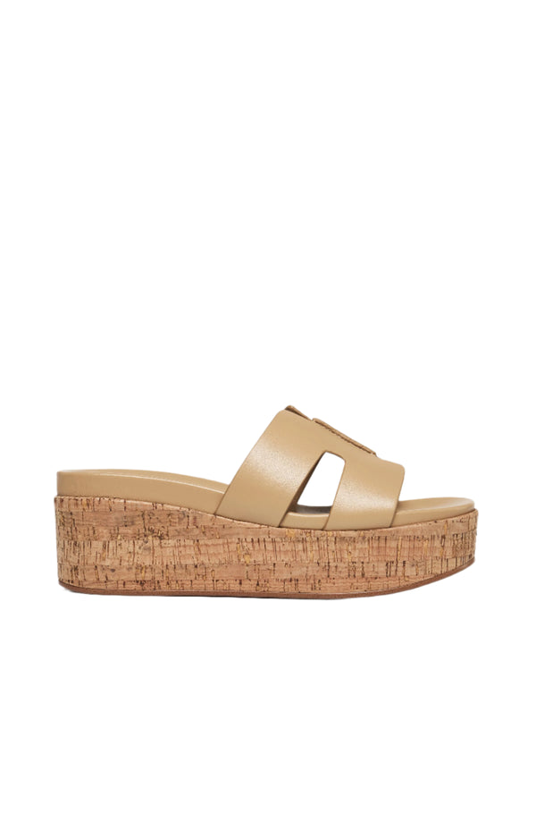 j slides QUEENIE sand