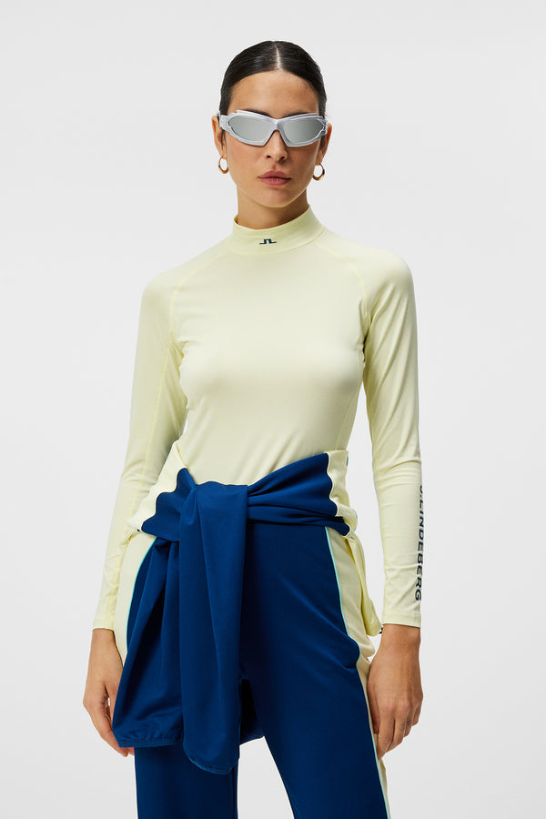 j.lindeberg Asa Soft Compression Top Wax Yellow