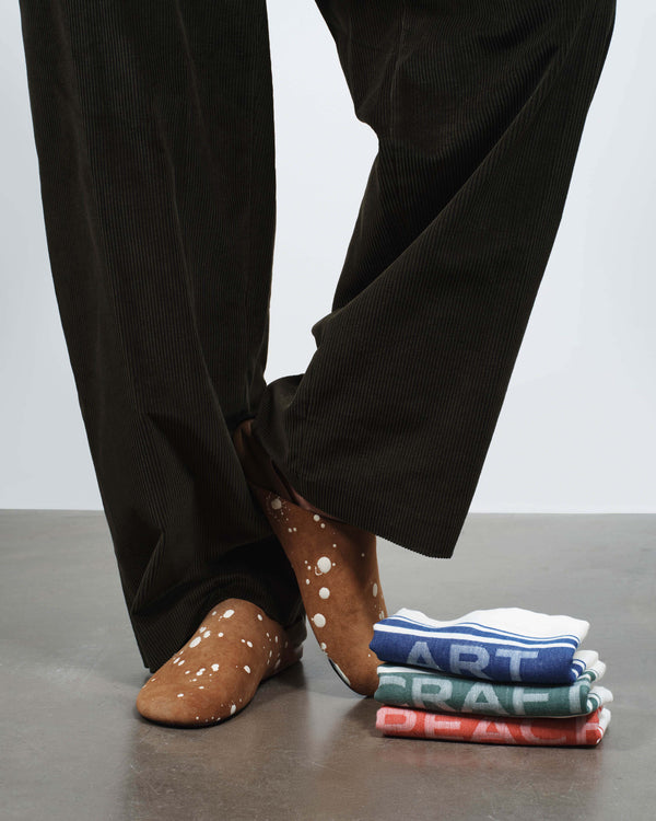 j.w.anderson Mens slipper mules in tan & cream