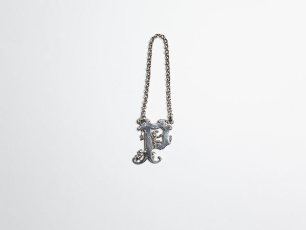 J.w.anderson Victorian Novelty Silver Cut Out Letter Wine Label In Silver