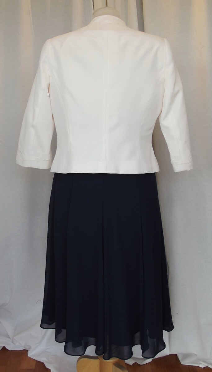 Jacques Vert FIT & FLARE DRESS OF IVORY LACE BODICE WITH NAVY CHIFFON SKIRT IVORY SHANTUNG JACKET LACE APPLIQUE