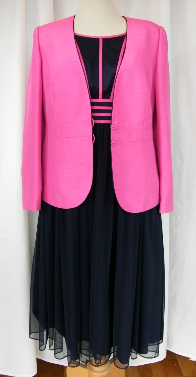 jacques vert FUSCHIA & NAVY RANGE NAVY NET SHIMMER PROM DRESS FUSCHIA RIBBONS ON BODICE & FUSCHIA SHANTUNG JACKET EDGED IN NAVY