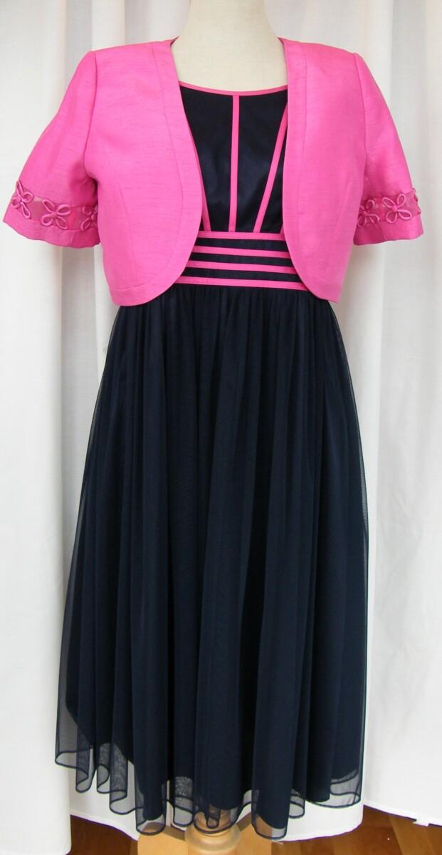 jacques vert FUSCHIA & NAVY RANGE NAVY NET SHIMMER PROM DRESS FUSCHIA RIBBONS ON BODICE & FUSCHIA SHANTUNG SHORT JACKET