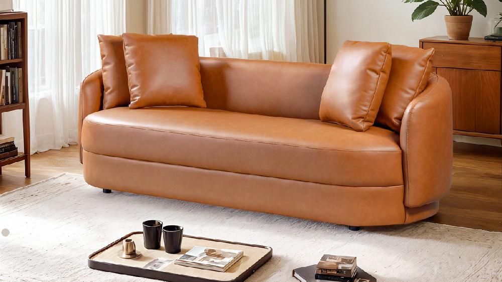 Jennifer Taylor Home Kaizu 85" Japandi Style Curved Composite Leather Sofa With Recessed Base Cognac