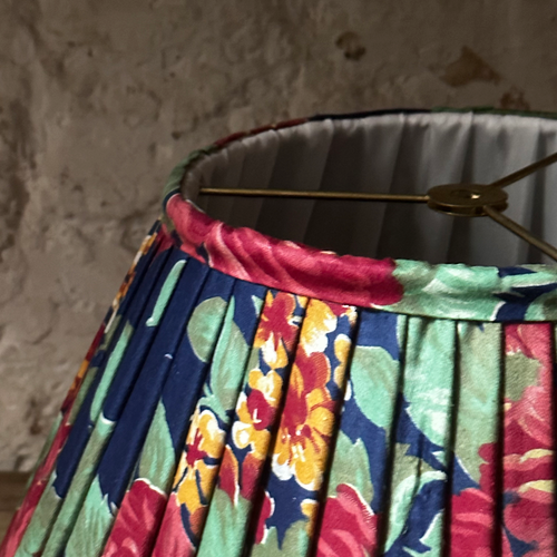 John Derian 14" Saved NY Pleated Fabric Lampshade #4122 Add To Cart Illuminate Your Space With The Bespoke Charm of This One-of-a-kind Hand-pleated Roller Print Fabric Lampshade In Shades Of Red Blue And Green. Crafted In Turke