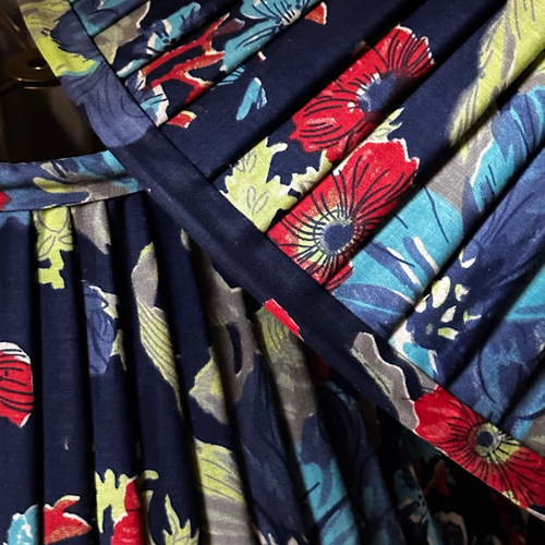 John Derian 14" Saved NY Pleated Fabric Lampshade Pair E Add To Cart Illuminate Your Space With The Bespoke Charm of This One-of-a-kind Hand-pleated Roller Print Fabric Lampshade In Shades Of Red Blue And Green. Crafted In Turk