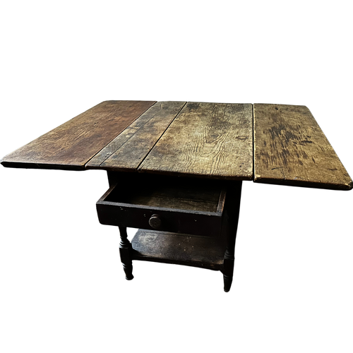 john derian 20th Century Drop-Leaf Table Add to cart Included in our carefully curated antique furniture collection is a 20th Century Drop-leaf Table expanding up to 57" wide. Drop-leaf tables with roots in the 18th century and