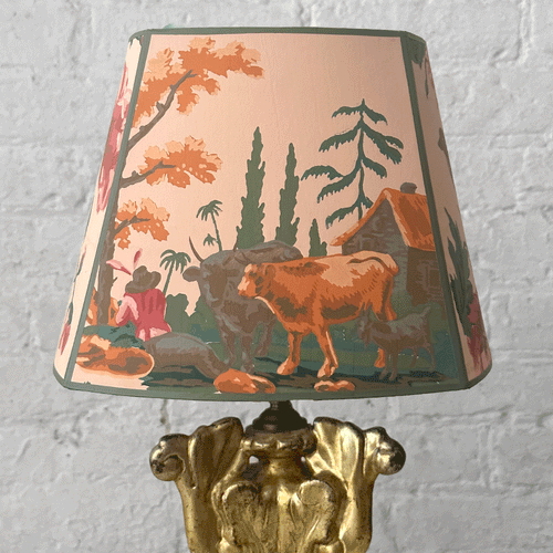 john derian 8" H Antique French Paper Custom Lampshade #A21 Add to cart Illuminate your space with a touch of the past with a custom lampshade crafted from antique French wallpaper. This timeless shade features a bucolic printed