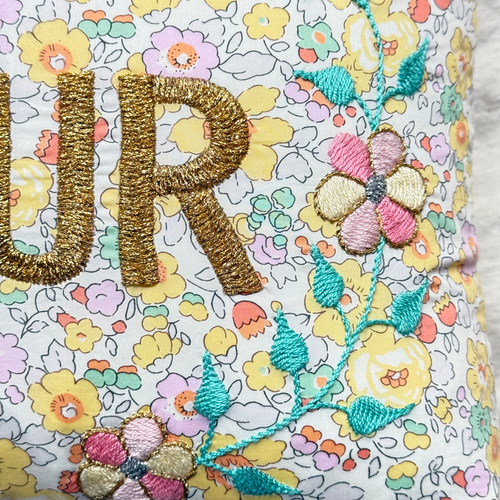 John Derian "Amour" Embroidered Cushion (CS 09-11) Add To Cart The "Amour" Embroidered Pillow By CSAO Features A Charming Floral Print Motif Hand-embroidered Lettering And Flowers Showcasing West African Craftsmanship. Notably E