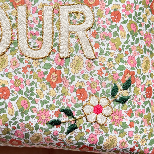 John Derian "Amour" Embroidered Cushion (CS 09-12) Add To Cart The "Amour" Embroidered Pillow By CSAO Features A Charming Floral Print Motif Hand-embroidered Lettering And Flowers Showcasing West African Craftsmanship. Notably E