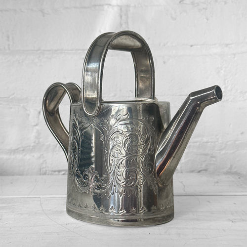 john derian Antique Engraved Silver-Plated Watering Can Teapot Add to cart This antique silver-plated teapot is among John Derian's trove of handpicked vintage & antique goods. Likely dating to the Victorian or Edwardian era th