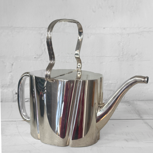 john derian Antique Silver-Plated Watering Can Teapot Add to cart This antique silver-plated teapot is among John Derian's trove of handpicked vintage & antique goods. Likely dating to the Victorian or Edwardian era this novelt