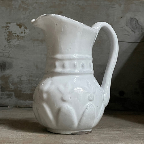 John Derian Aphrodite Vase Add To Cart Pitcher 3.5" L X 3.5" W X 4.1" H Black Terra Cotta With White Enameled Glaze Each Item Will Feature Unique Variations Made In Paris Care Dishwasher Safe On A Moderate Wash Cycle. Not Mic