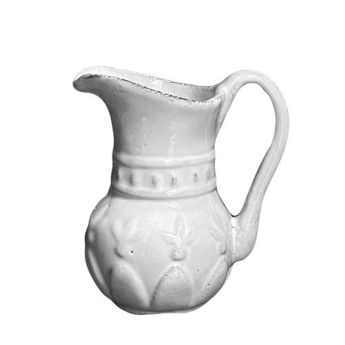 john derian Aphrodite Vase Add to cart Pitcher 3.5" L x 3.5" W x 4.1" H Black Terra Cotta with White Enameled Glaze Each item will feature unique variations Made in Paris Care Dishwasher safe on a moderate wash cycle. Not mic