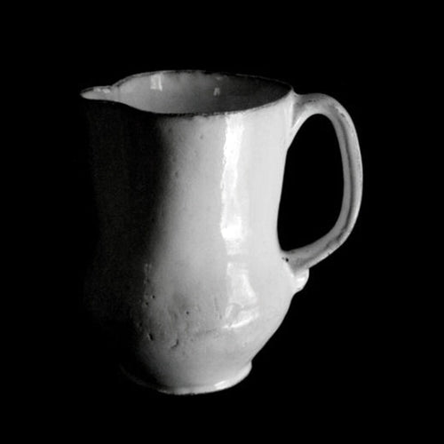 john derian Baluster Pitcher Add to cart Pitcher Details 7.3" L x 5.3" W x 7.5" H Black Terra Cotta with White Enameled Glaze Each item will feature unique variations Made in Paris Care Dishwasher safe on a moderate wash cycle.