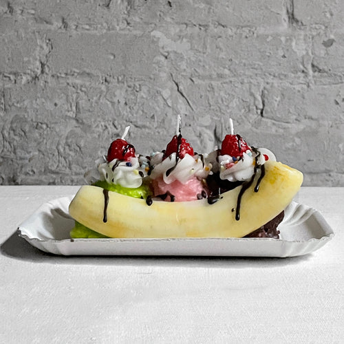 John Derian Banana Split Candle Add To Cart Details 7.75" L X 3.75" W X 3" H Paraffin Wax Each Item Will Feature Unique Variations Made In Italy Care Remove All Paper Before Burning. Not Intended For Children.   Cereria Intron