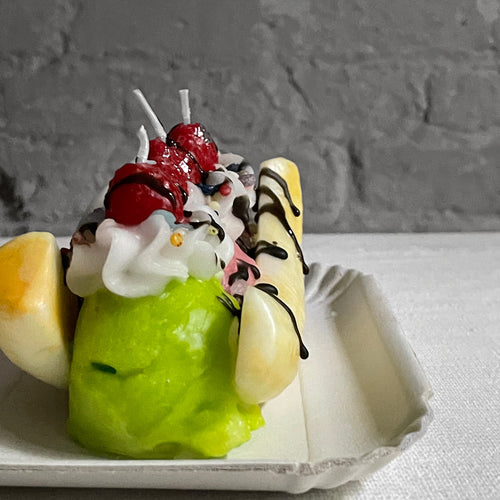 John Derian Banana Split Candle Add To Cart Details 7.75" L X 3.75" W X 3" H Paraffin Wax Each Item Will Feature Unique Variations Made In Italy Care Remove All Paper Before Burning. Not Intended For Children.   Cereria Intron