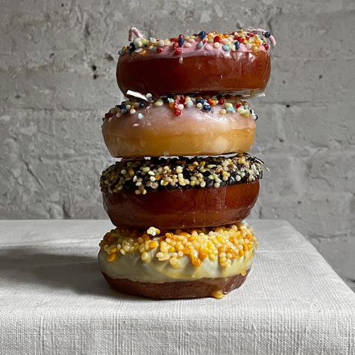 John Derian Ciambella White Frosting Doughnut Candle Add To Cart Details 4" Diameter Paraffin Wax Each Item Will Feature Unique Variations Made In Italy Care Remove All Paper Before Burning. Not Intended For Children.   Cereria