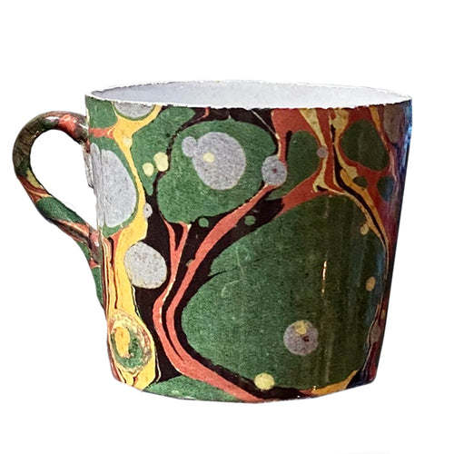 john derian Cup with Green Red & Yellow Marble Exterior Add to cart Tasse Exterieur Marbre Vert Rouge Jaune Details 3" Diameter x 4.5"W x 3" H Glazed terracotta Made in Paris Care Dishwasher safe on a moderate wash cycle. Not m