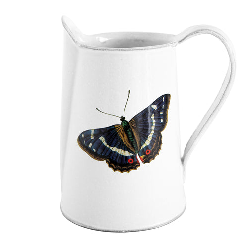 john derian Dancing Butterflies Pitcher Add to cart Details 4.5" L × 2.6" W × 5.3" H Glazed terracotta Made in Paris Care Dishwasher safe on a moderate wash cycle. Not microwave safe.  John Derian teamed up with Astier de Vil