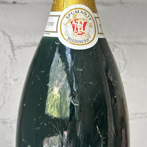 John Derian Extra Large Spumante Sparkling Wine Bottle Candle Add To Cart Details 15.5" H Paraffin Wax Each Item Will Feature Unique Variations Box Not Included Made In Italy Care Remove All Paper Before Burning. Not Intended