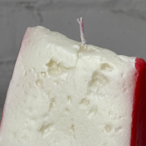 John Derian Fetta Formaggio Red & Black Cheese Slice Candles Red - $30.00 Black - $30.00