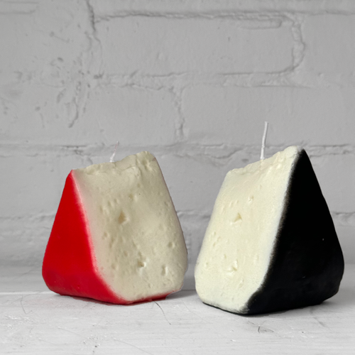 john derian Fetta Formaggio Red & Black Cheese Slice Candles Red - $30.00 Black - $30.00