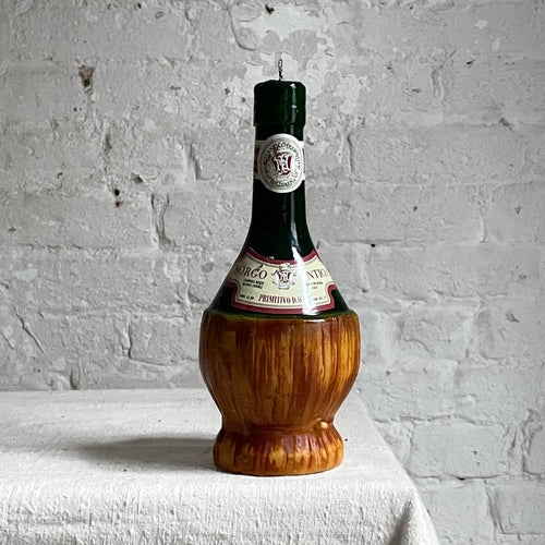 john derian Fiaschetto Vino White Wine Basket Bottle Candle Add to cart Details 10" H Paraffin Wax Each item will feature unique variations Made in Italy Care Remove All Paper Before Burning. Not intended for children.   Cerer