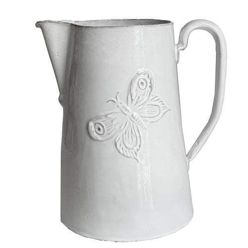 John Derian Fleur Pitcher Add To Cart Pichet 8.1" W X 6.1" L X 8.5" H Black Terra Cotta With White Enameled Glaze Each Item Will Feature Unique Variations Made In Paris Care Dishwasher Safe On A Moderate Wash Cycle. Not Micro