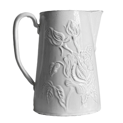 john derian Fleur Pitcher Add to cart Pichet 8.1" W x 6.1" L x 8.5" H Black Terra Cotta with White Enameled Glaze Each item will feature unique variations Made in Paris Care Dishwasher safe on a moderate wash cycle. Not micro