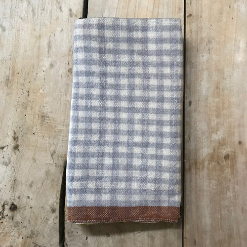 john derian Gingham Tea Towel in Blue & Cognac Add to cart Details 30" x 20" 100% Hand-Spun Linen Made in India Care Machine wash cold Gentle cycle Tumble dry. Do not Bleach.   Caravan a celebrated home and lifestyle brand emb