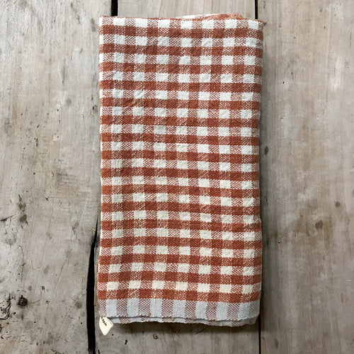 john derian Gingham Tea Towel in Cognac & Blue Add to cart Details 30" x 20" 100% Hand-Spun Linen Made in India Care Machine wash cold Gentle cycle Tumble dry. Do not Bleach.   Caravan a celebrated home and lifestyle brand emb