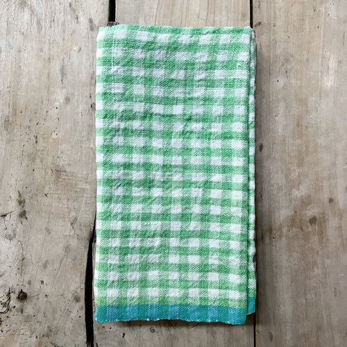 john derian Gingham Tea Towel in Lime & Aqua Add to cart Details 30" x 20" 100% Hand-Spun Linen Made in India Care Machine wash cold Gentle cycle Tumble dry. Do not Bleach.   Caravan a celebrated home and lifestyle brand embod