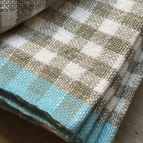 John Derian Gingham Tea Towel In Natural & Aqua Add To Cart Details 30" X 20" 100% Hand-Spun Linen Made In India Care Machine Wash Cold Gentle Cycle Tumble Dry. Do Not Bleach.     Caravan A Celebrated Home And Lifestyle Brand