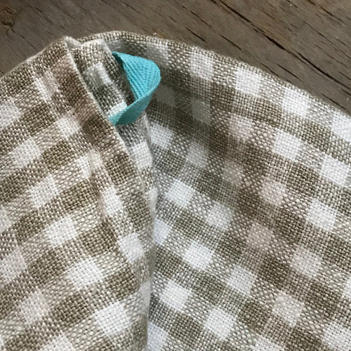 John Derian Gingham Tea Towel In Natural & Aqua Add To Cart Details 30" X 20" 100% Hand-Spun Linen Made In India Care Machine Wash Cold Gentle Cycle Tumble Dry. Do Not Bleach.     Caravan A Celebrated Home And Lifestyle Brand