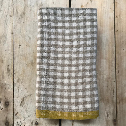 john derian Gingham Tea Towel in Natural & Dijon Add to cart Details 30" x 20" 100% Hand-Spun Linen Made in India Care Machine wash cold Gentle cycle Tumble dry. Do not Bleach.   Caravan a celebrated home and lifestyle brand e
