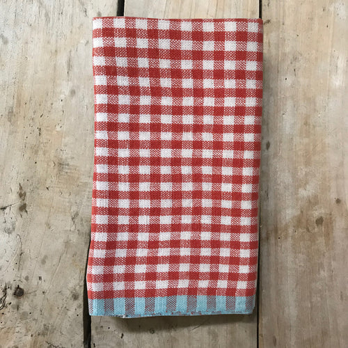 john derian Gingham Tea Towel in Orange & Aqua Add to cart Details 30" x 20" 100% Hand-Spun Linen Made in India Care Machine wash cold Gentle cycle Tumble dry. Do not Bleach.   Caravan a celebrated home and lifestyle brand emb